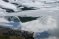 Steindalsnosa speglar seg blandt isflak i øvre Hervavatnet